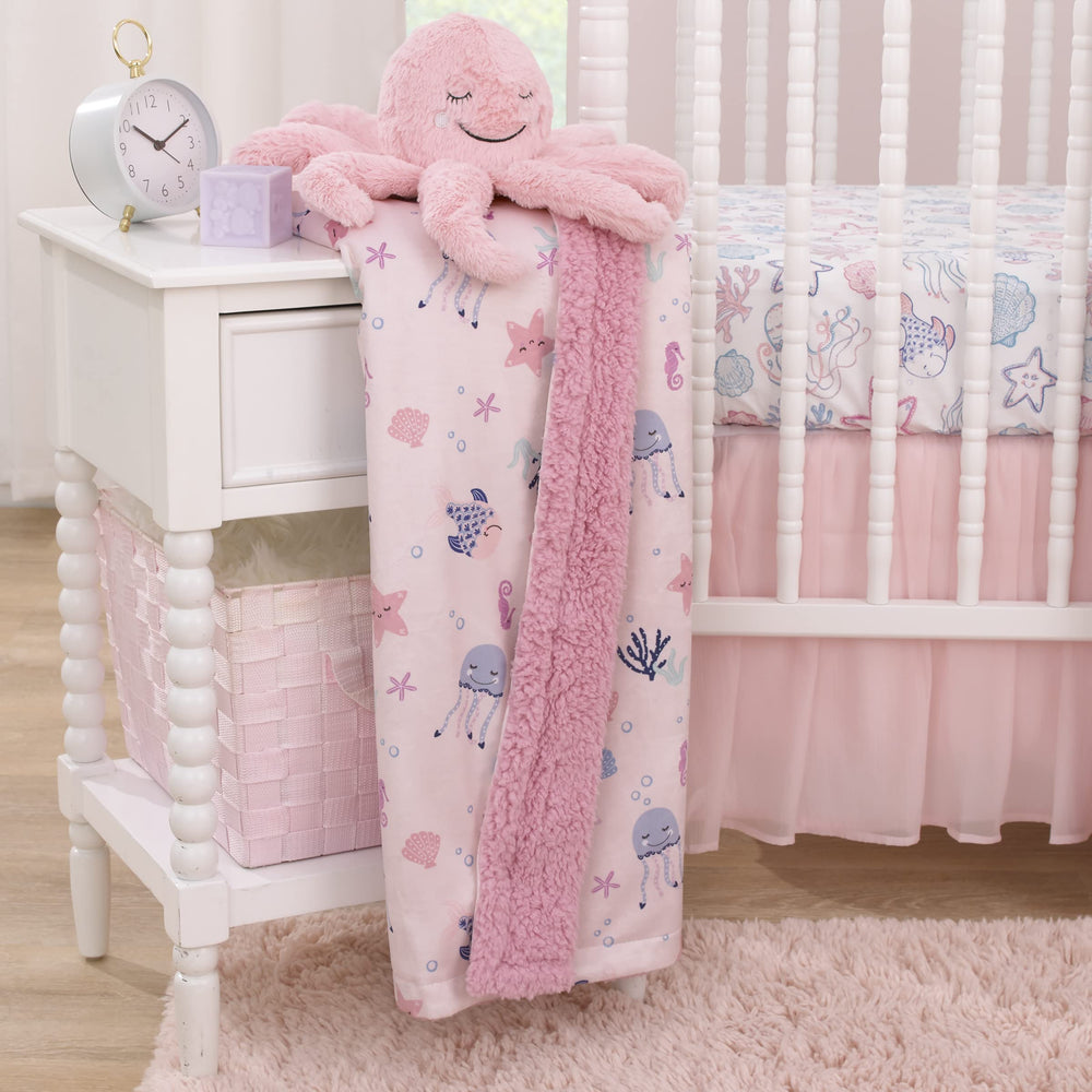 NoJo Mermaid Lagoon blanket in stroller illustrates on-the-go comfort.