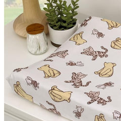 NoJo Pooh Piglet Tigger print adds whimsy while keeping baby dry during changes.