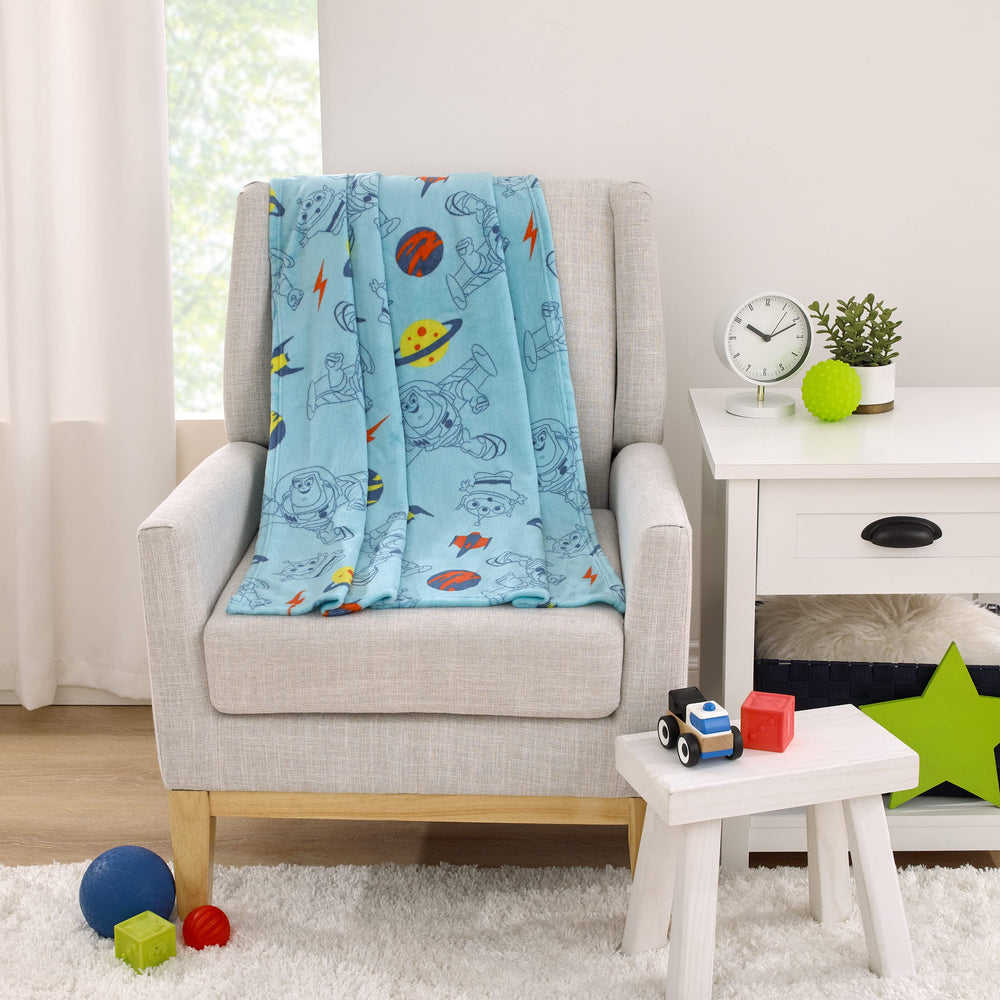 NoJo Toy Story Buzz Lightyear baby blanket in use on stroller proves on-the-go comfort.