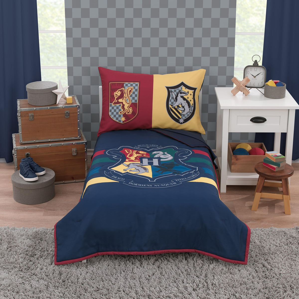 NoJo Harry Potter bed set comforter on toddler bed with Hogwarts colors for cozy sleep
