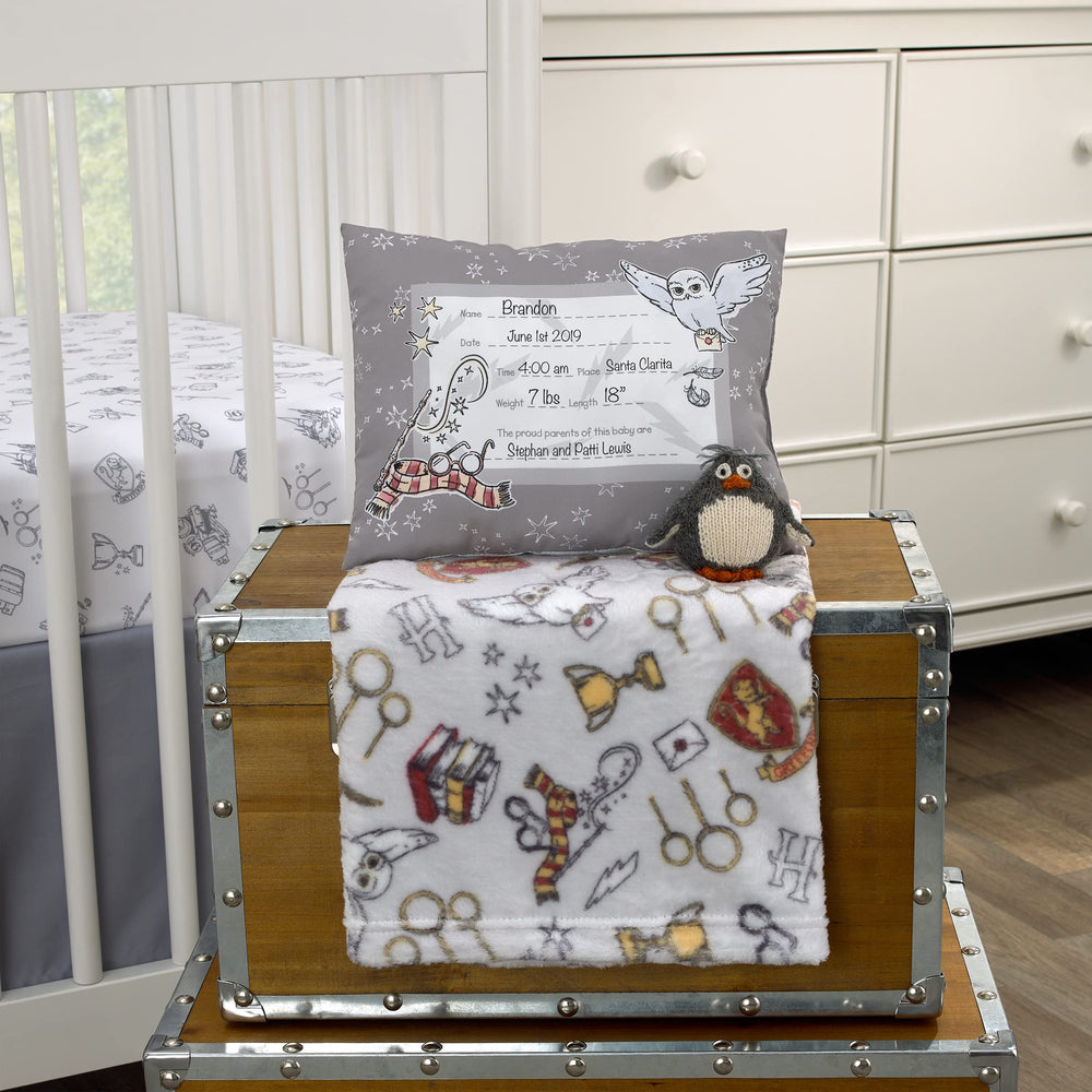 NoJo keepsake pillow back shows reversible all over icon pattern.