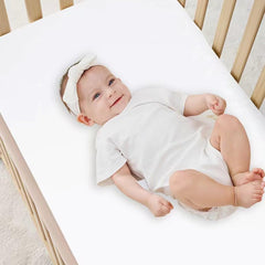 NOKOLULU deep-pocket design securely fits crib mattresses