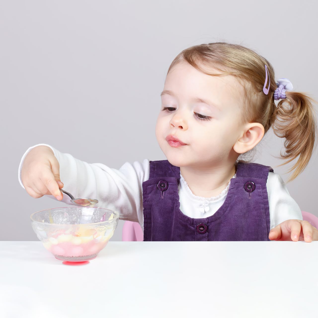 NOLITOY soft-silicone plate-rest provides gentle, non-slip grip.