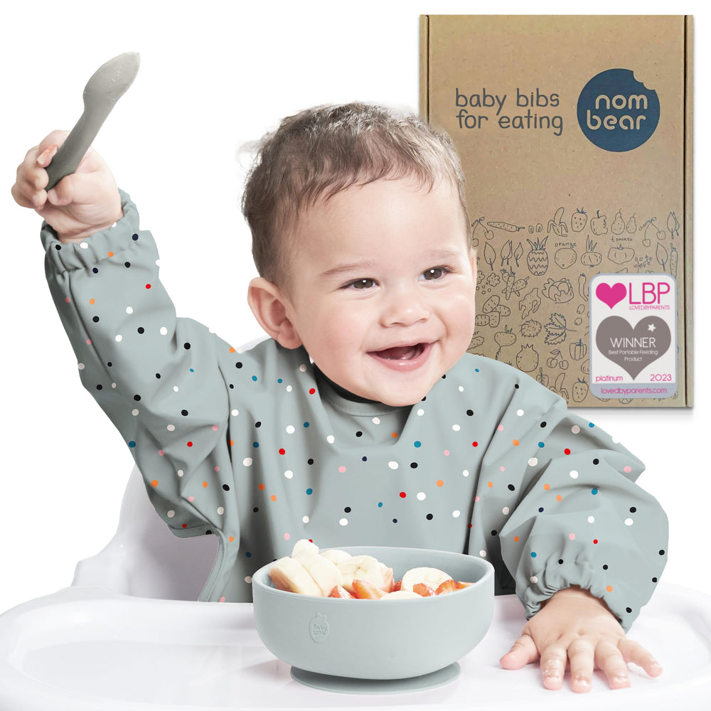 Nombear waterproof smock bib for eating keeps outfits clean during baby-led weaning.