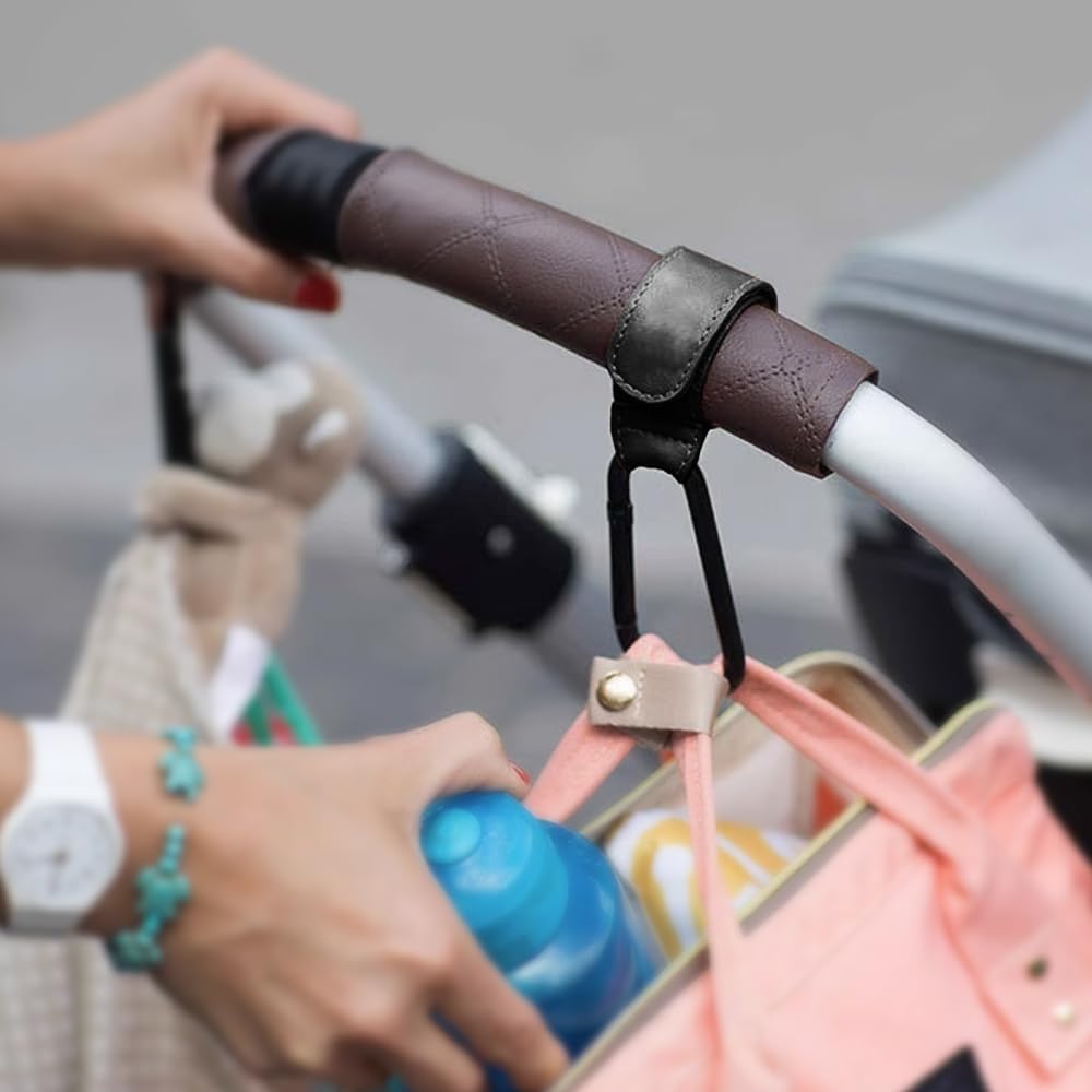 Noneea stroller hook close-up highlighting aluminum and PU leather construction.