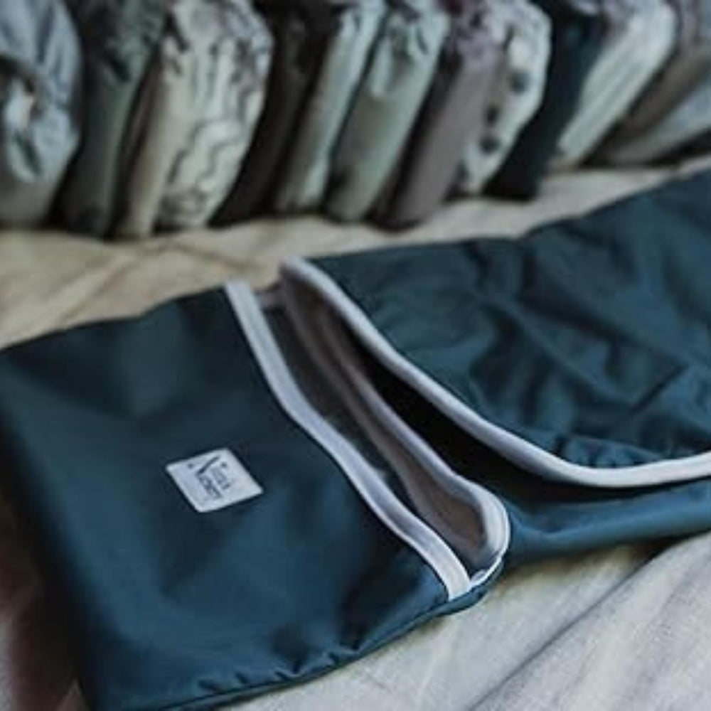 Nora's Nursery Sea bamboo-absorbent side for gentle liquid changes.