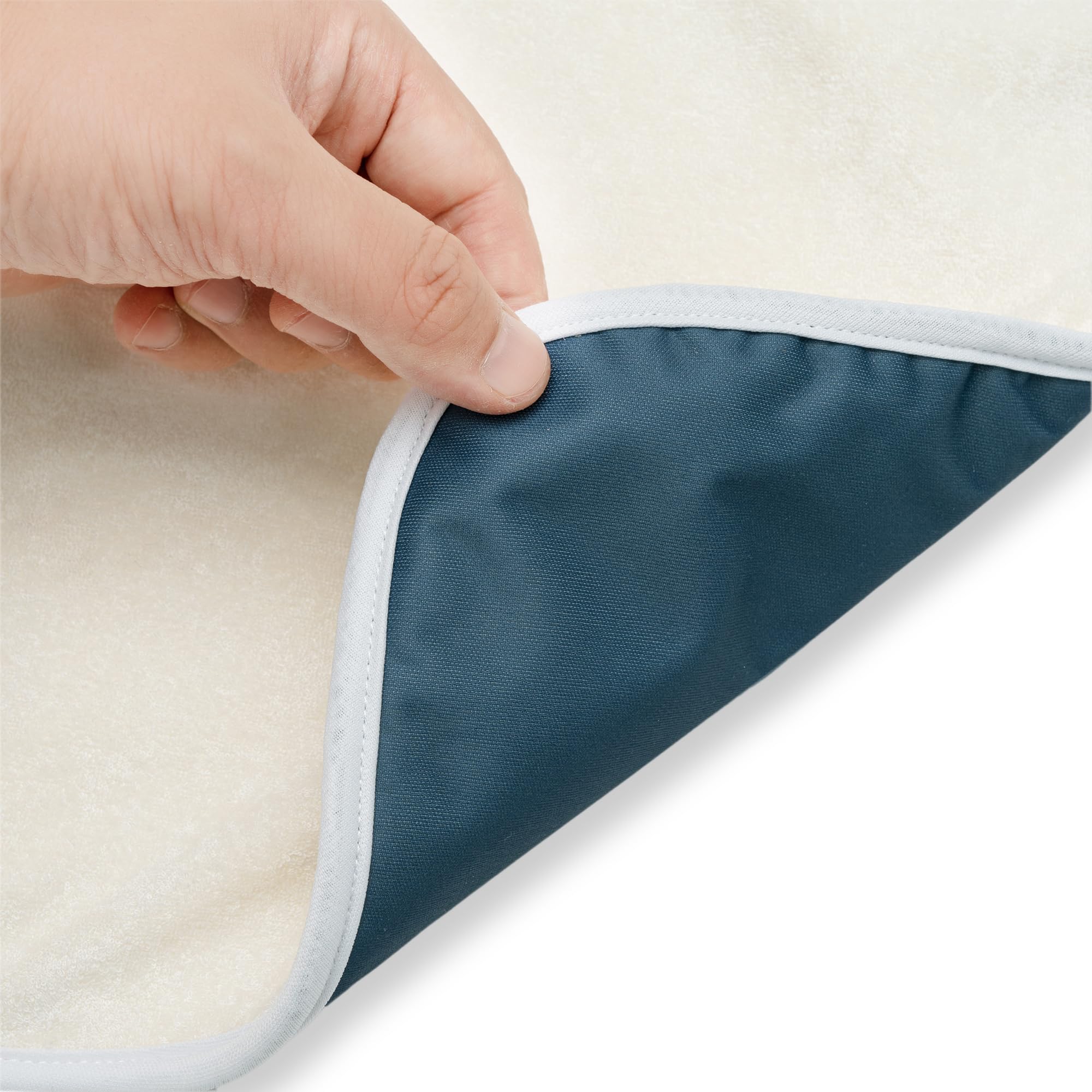 Nora's Nursery Sea machine-washable pad ready for easy cleaning.