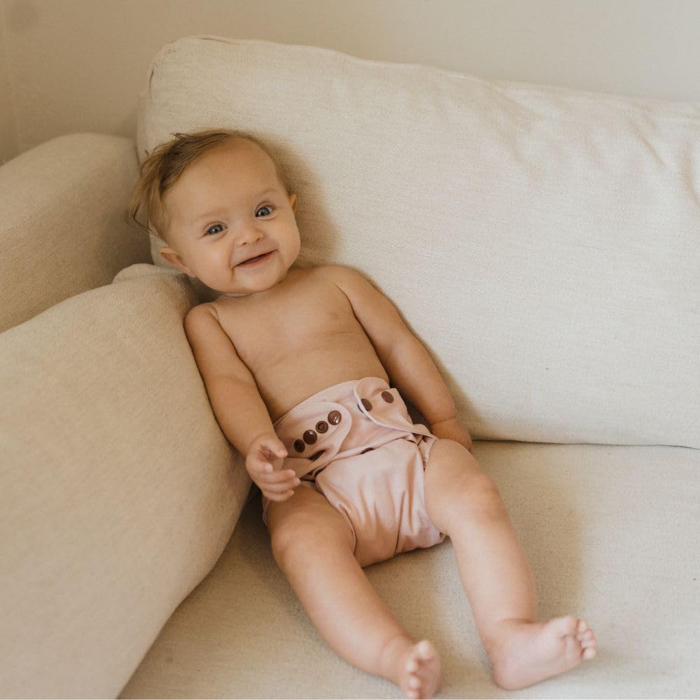 Nora's Nursery baby wearing diaper for comfortable daytime wear