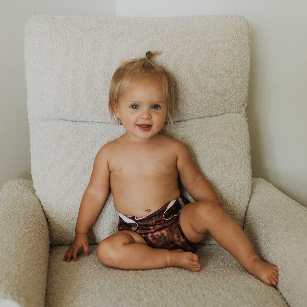 Nora's Nursery Dahlia exterior waterproof cover supports spill-free outings.