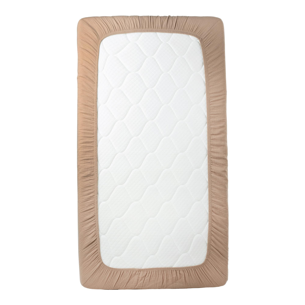 Nora's Nursery easy-care crib sheet remains soft after washing.