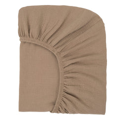 Nora's Nursery muslin crib sheets show breathable softness for baby sleep.
