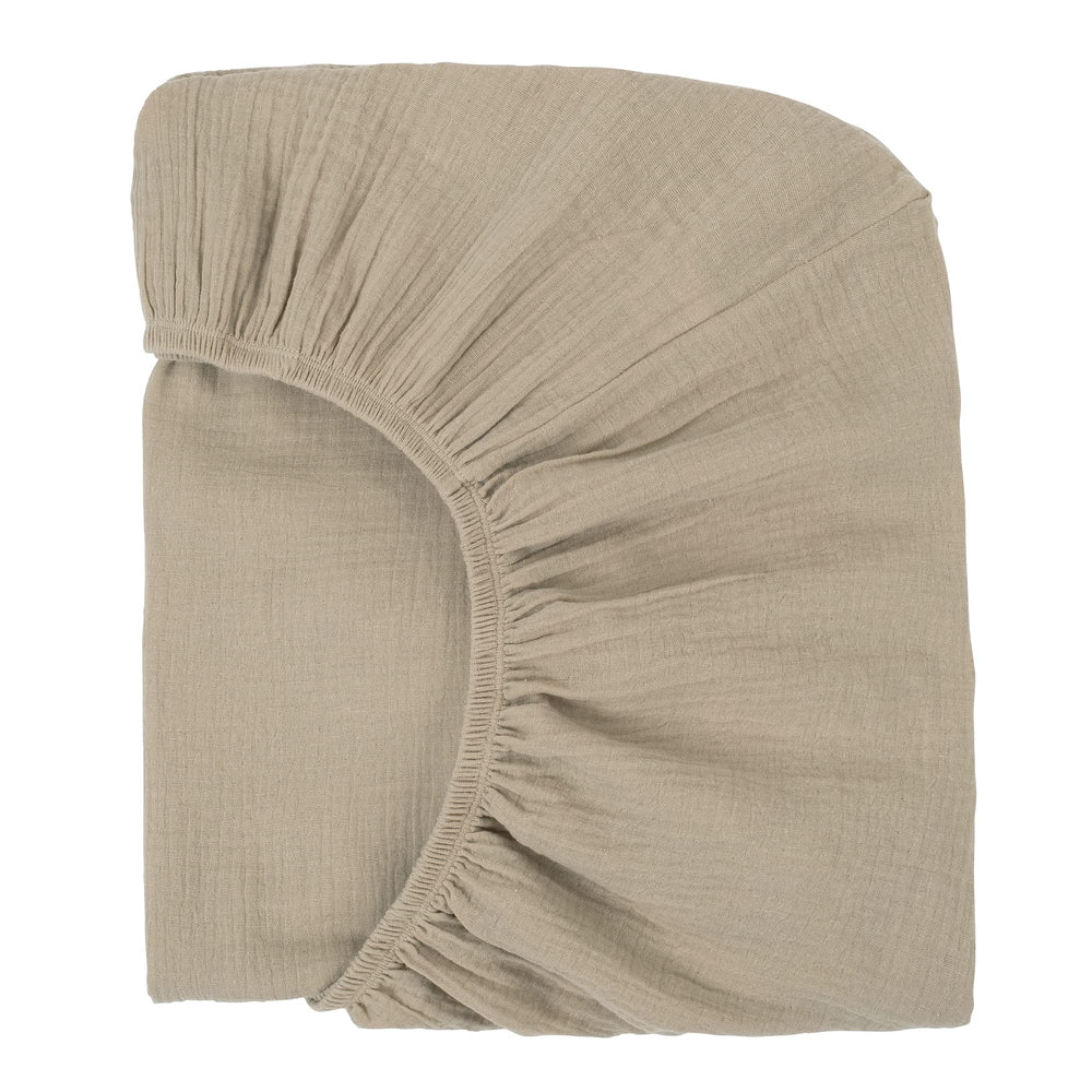 Nora's Nursery muslin crib sheets latte close-up of soft organic cotton for gentle sleep