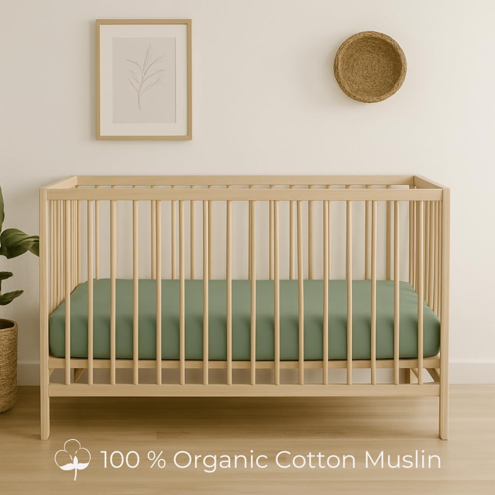 Nora's Nursery sage nursery setup image: versatile design for girl, boy, or neutral themes.