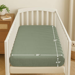 Nora's Nursery sage fit 52x28: secure, snug crib sheet for safe sleep, simple to adjust.