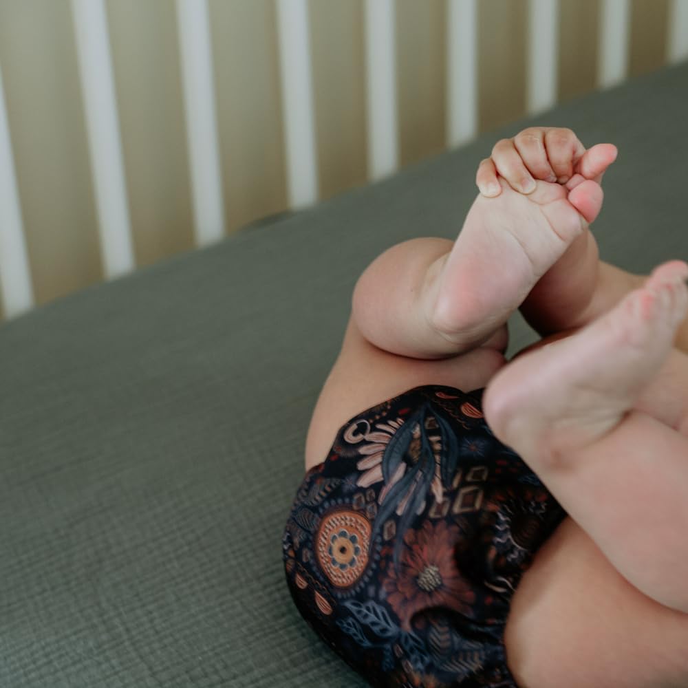 Nora's Nursery sage crib sheets: neutral color to complement any nursery and decor.