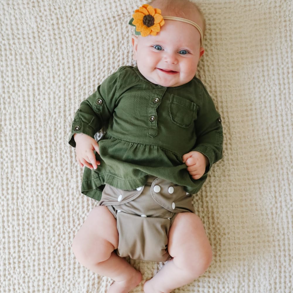 Nora's Nursery on-the-go diaper change scenario with diaper bag.