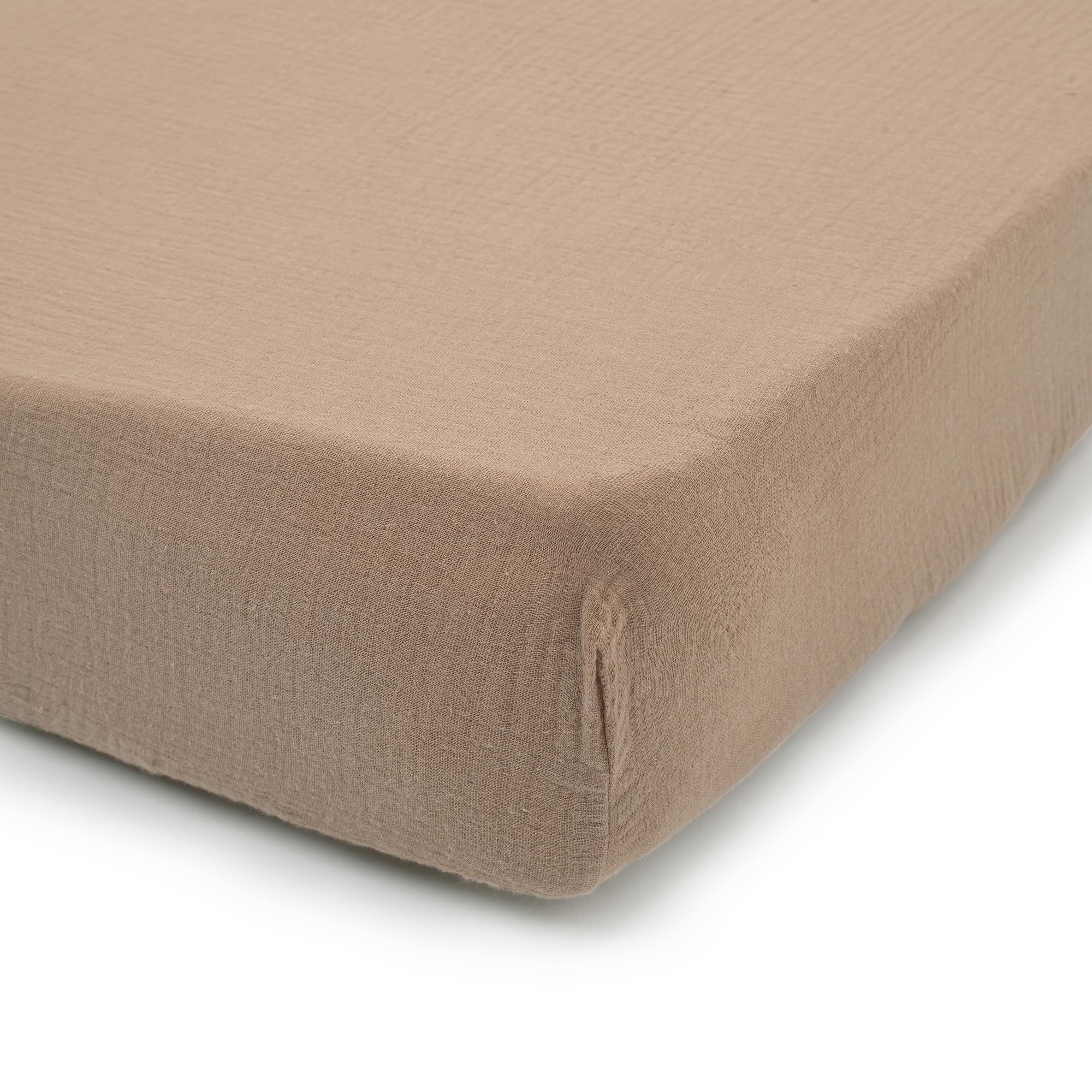 Nora's Nursery organic cotton crib sheets fit 52x28 inches snugly on standard mattresses.