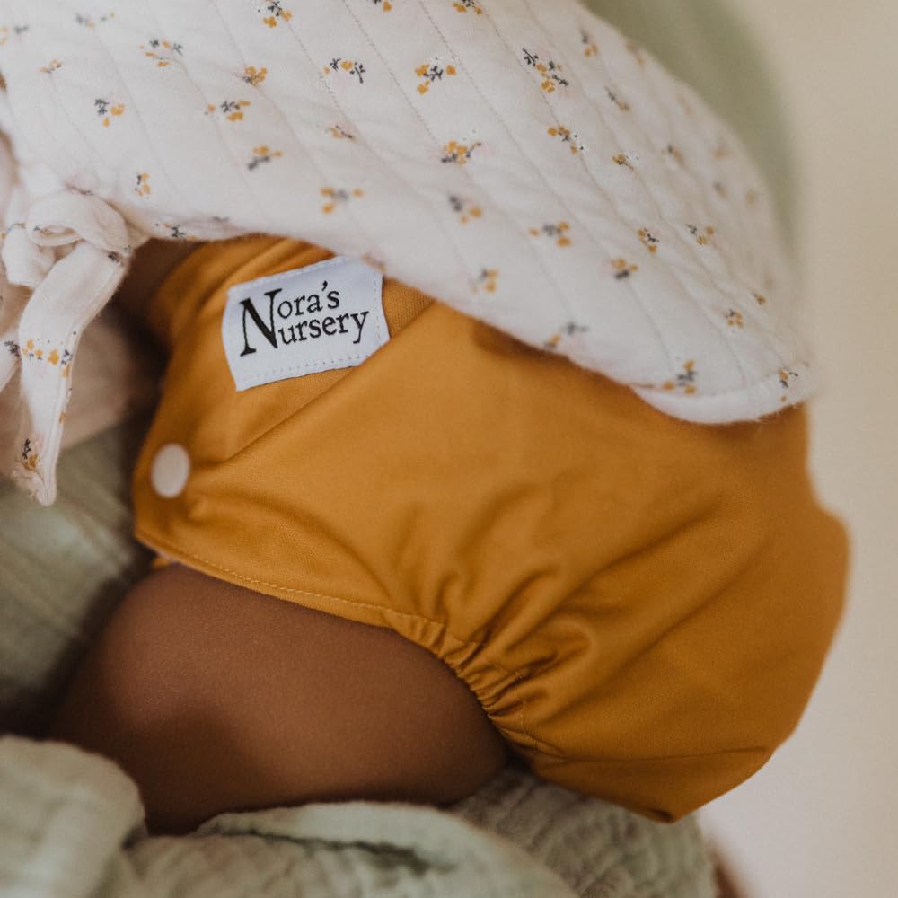 Nora's Nursery Pacific Neutrals pack highlights eco-friendly reuse.