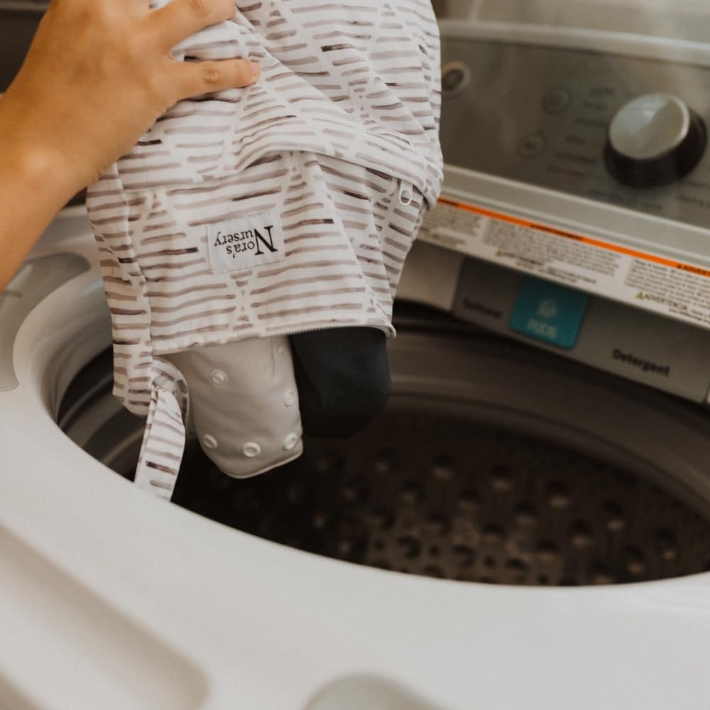 Nora's Nursery wet-dry bag travel essentials helps keep outfits separated and easy to find.