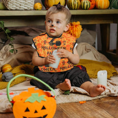 norinori baby bib large pocket protects clothing from spills during meals.