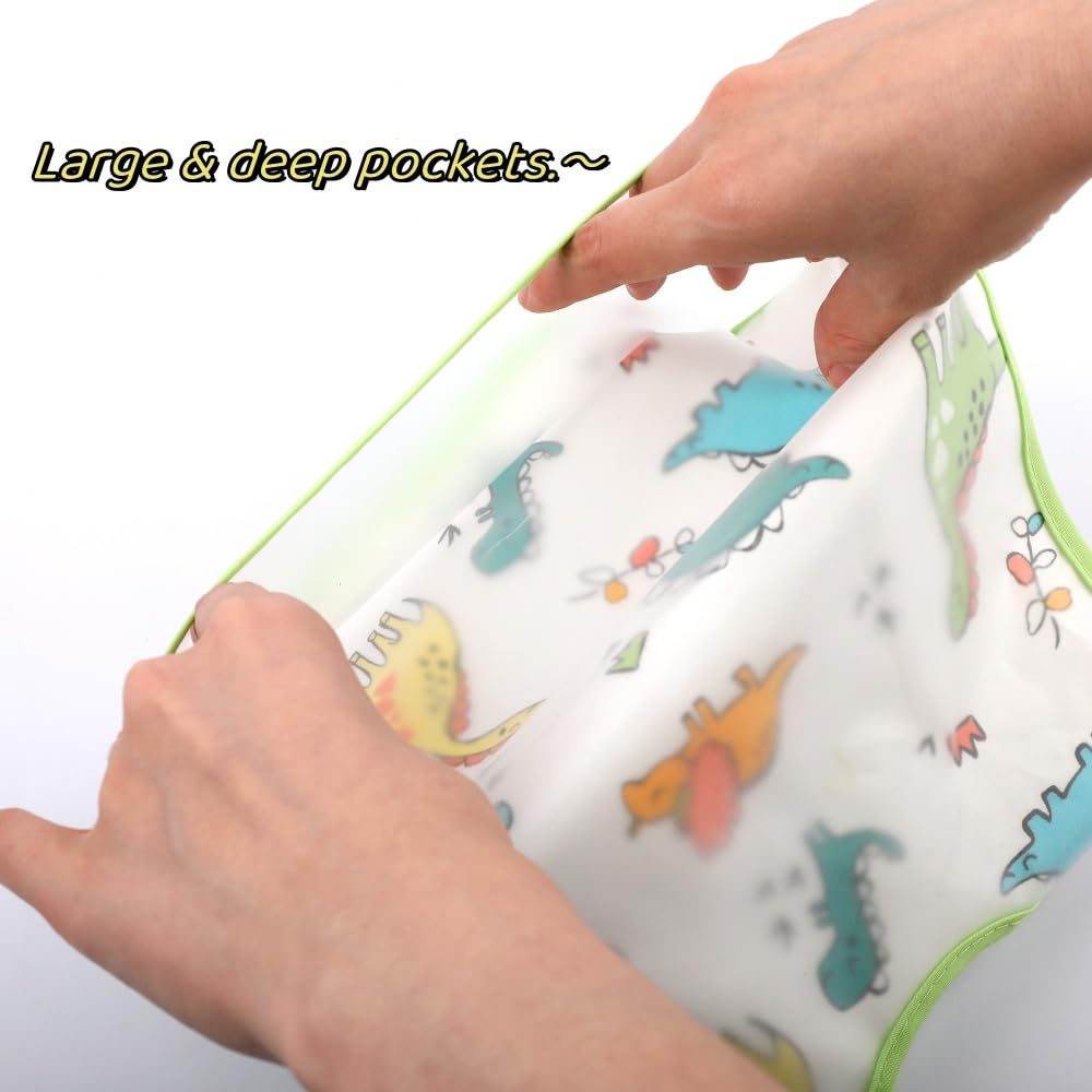 norinori baby bib pocket closeup highlights deep pocket catching crumbs and sauces.