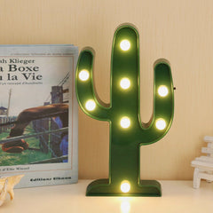 Novelty Place cactus marquee light enhances living room decor with tropical vibe