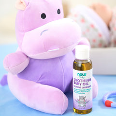 NOW Foods Baby Soothing Oil bottle in bedtime ritual setup for easy application