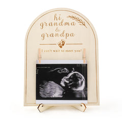 NOWHYX ultrasoun-d frame grandparent surprise on wooden display makes a keepsake moment.