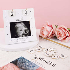 NQEUEPN ultrasound-slot frame keeps memories secure and easy to display.