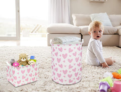 NTAOHAMPER pink heart hamper folded for compact storage when not in use.