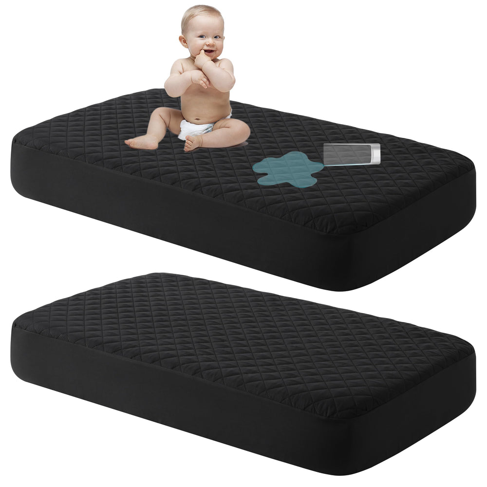 NTBAY 2-pack waterproof mini crib protector folded showing spill protection