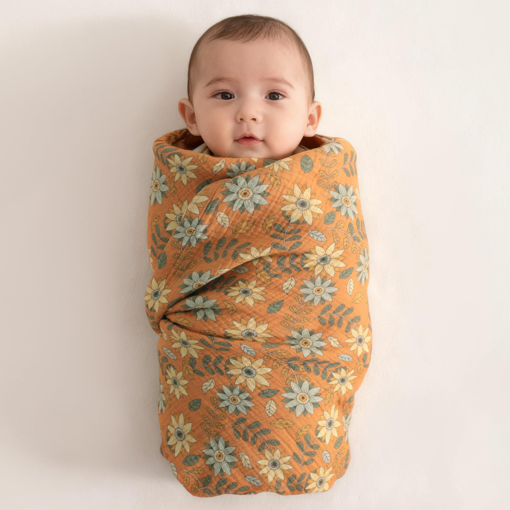 NTBAY newborn swaddle setup using breathable fabric for cozy wrap.