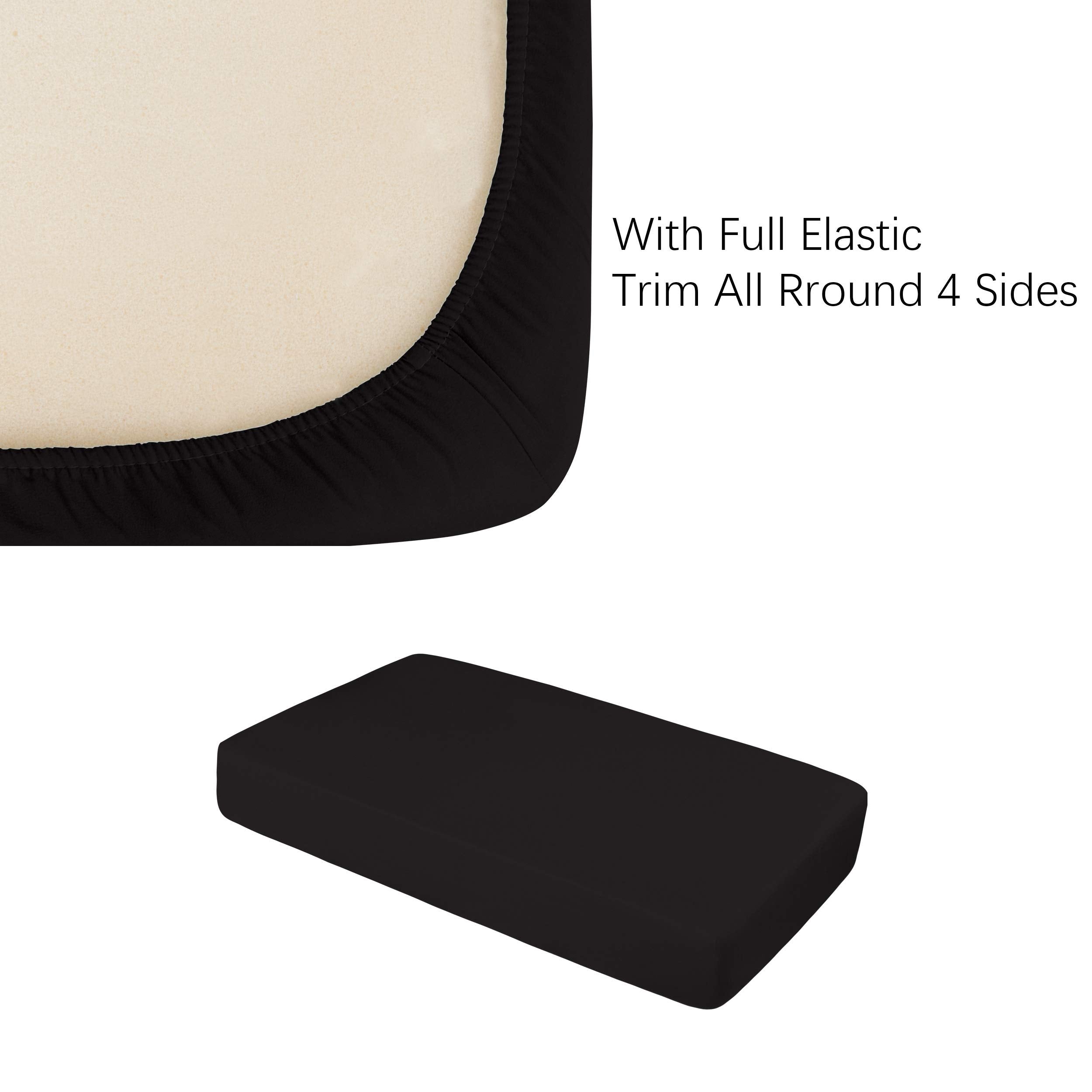 NTBAY fitted crib sheet on a mattress demonstrates full elastic trim for secure fit.