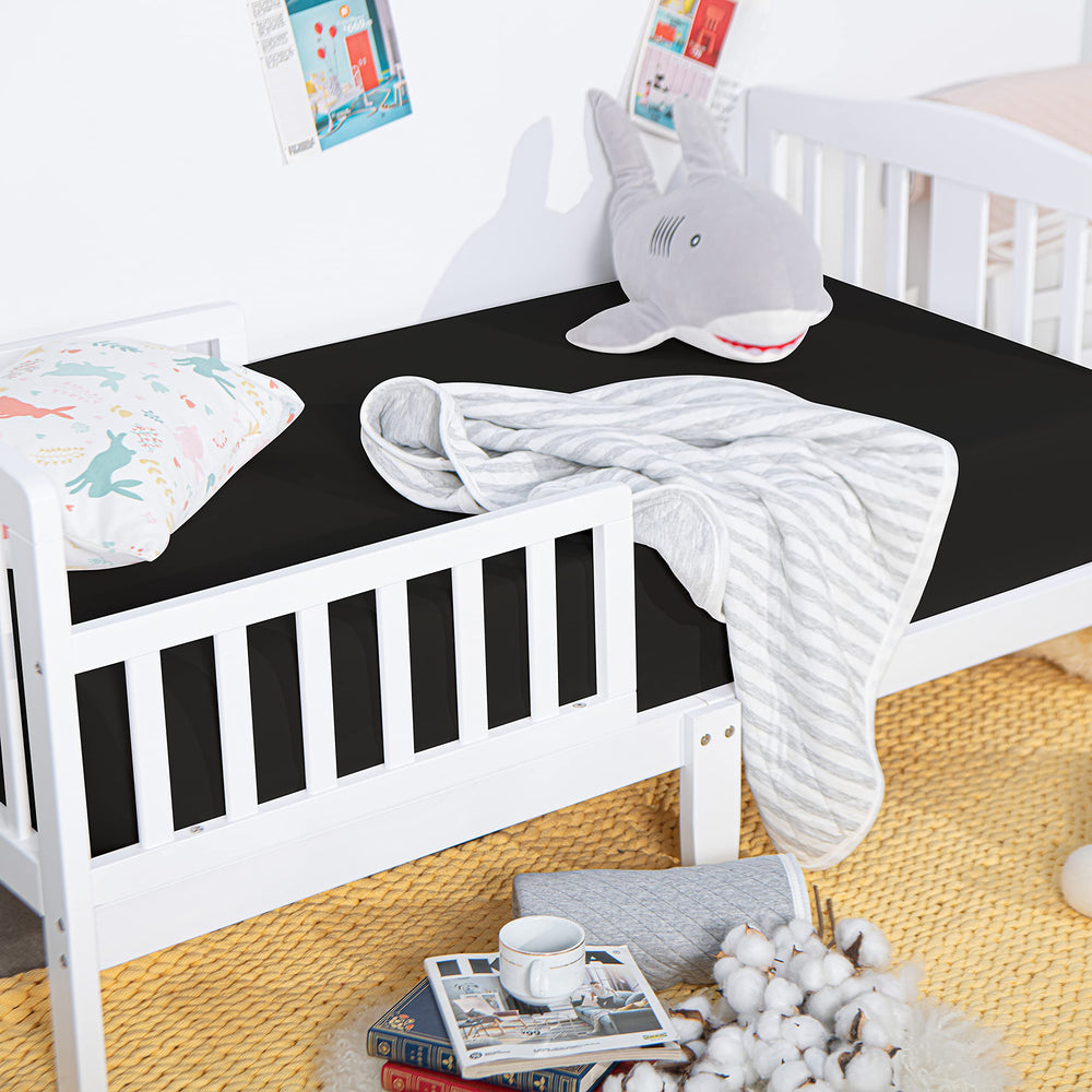 NTBAY microfiber texture highlights a tidy crib corner for ultra-soft comfort.