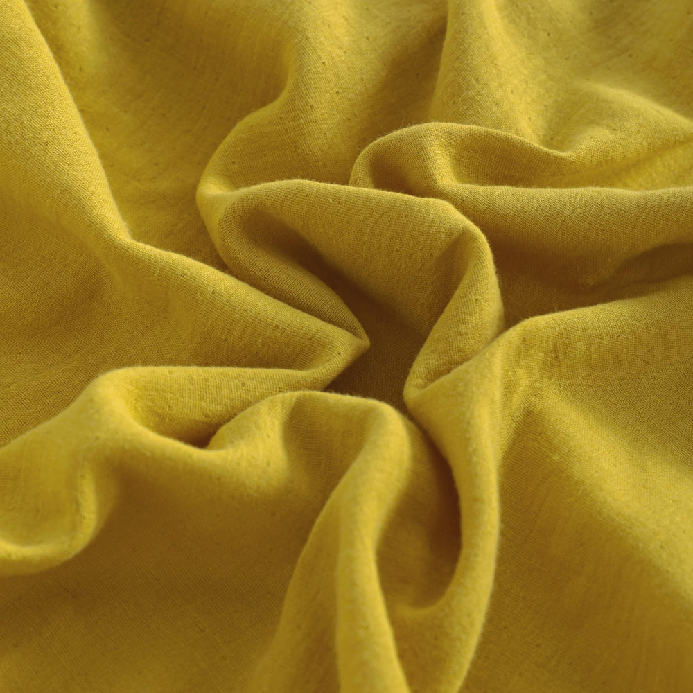 NTBAY crib-sheet elastic-360 image demonstrates secure fit during baby movement