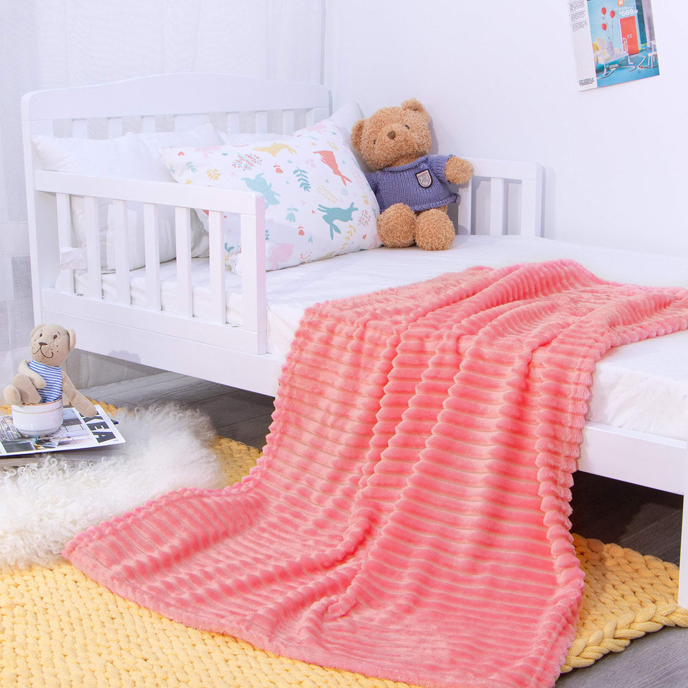 NTBAY flannel fuzzy toddler blanket pink 30x40 displayed as travel cover
