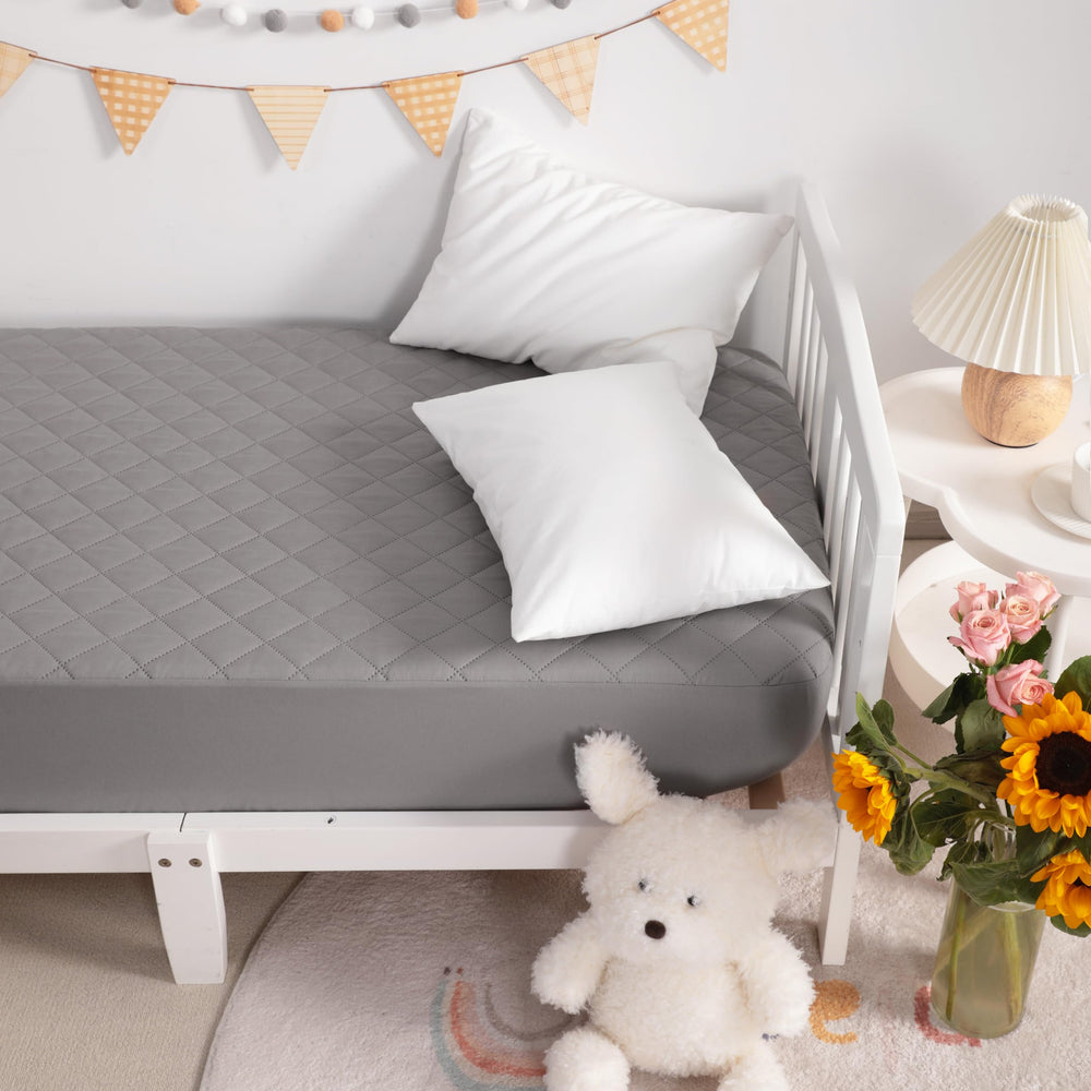 NTBAY machine washable mattress cover for easy care.