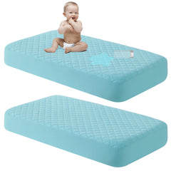 NTBAY mini crib protector in aqua with quilted surface for gentle protection