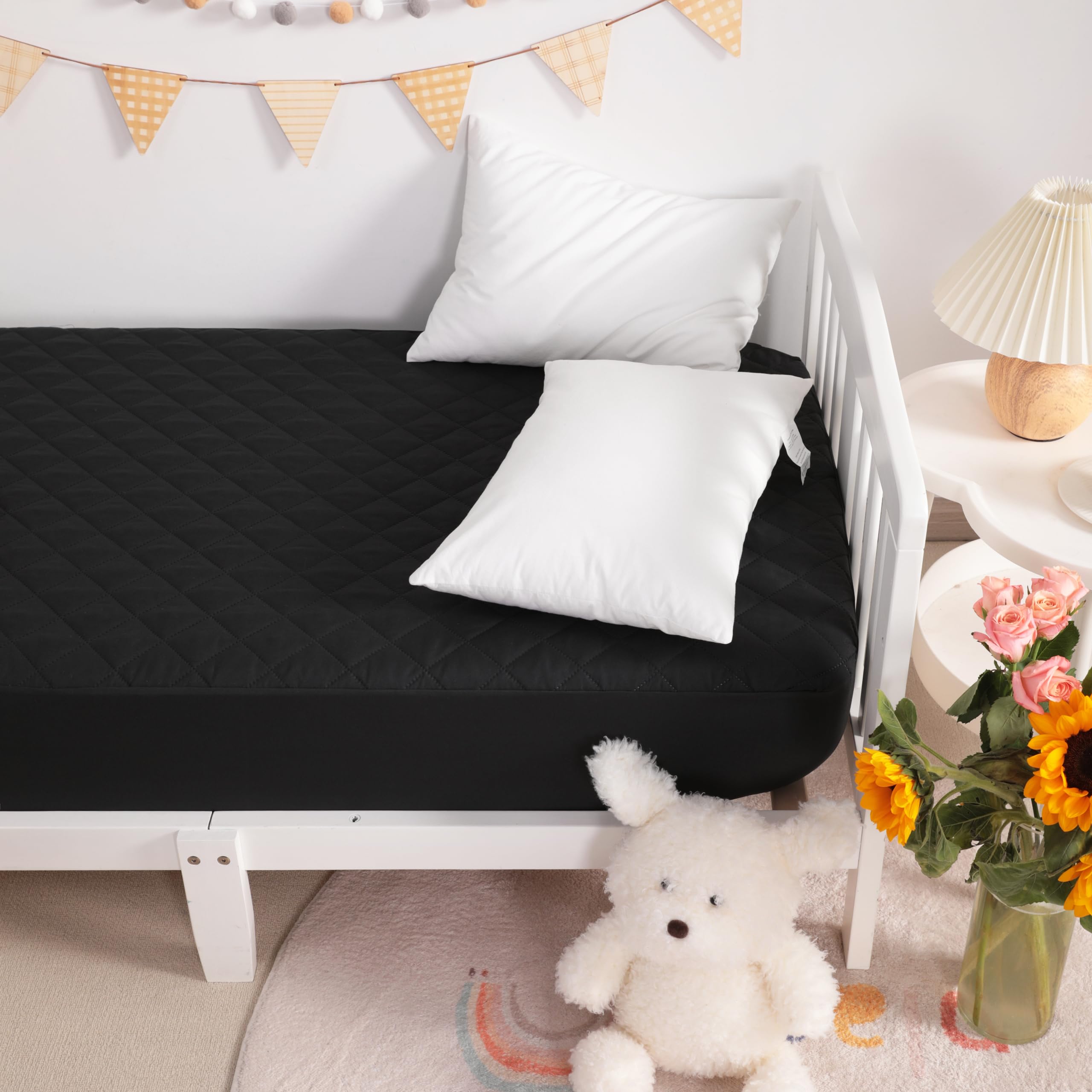 NTBAY mini crib protector in use on a baby playard for protection