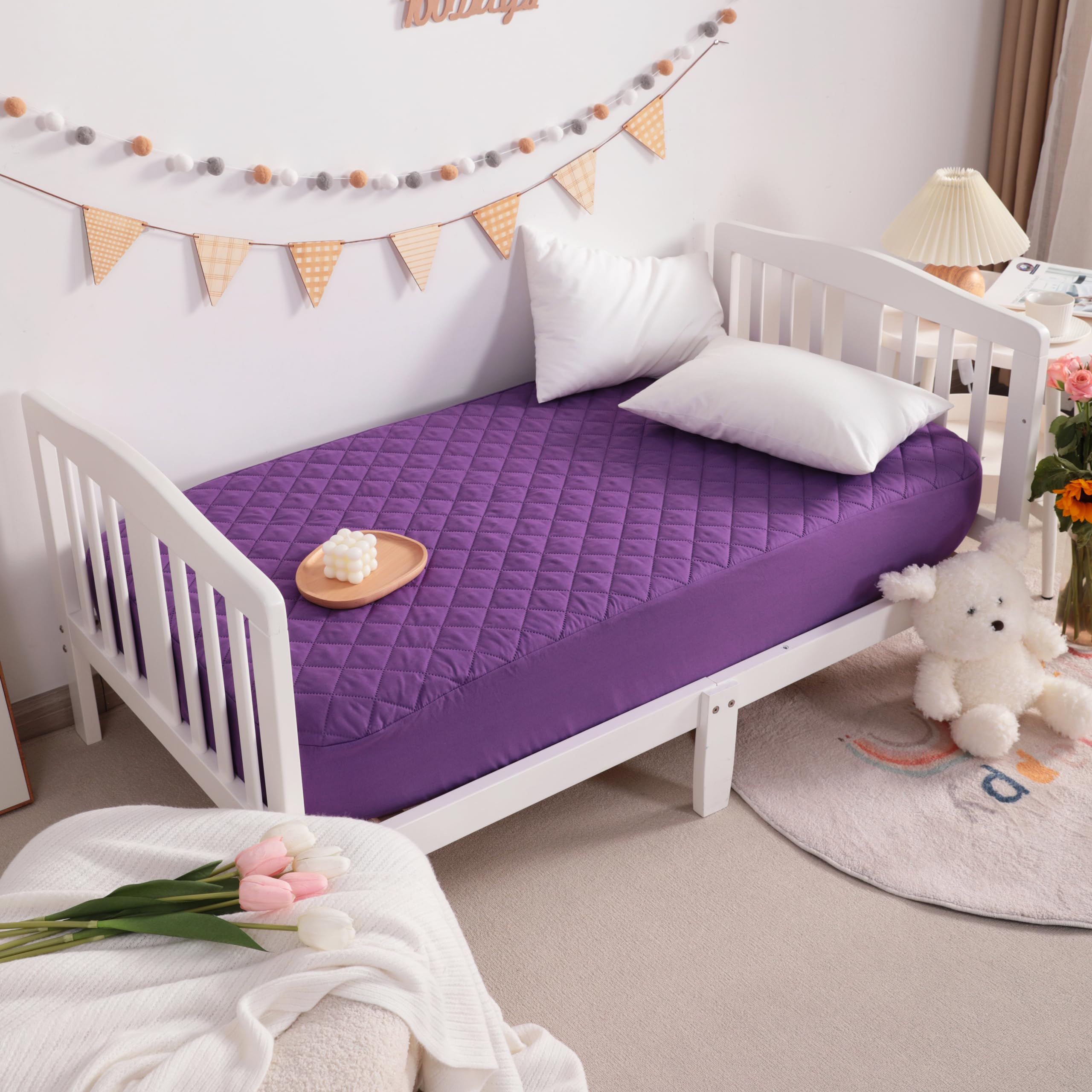 NTBAY protector on a baby playard during nap time for mess protection.