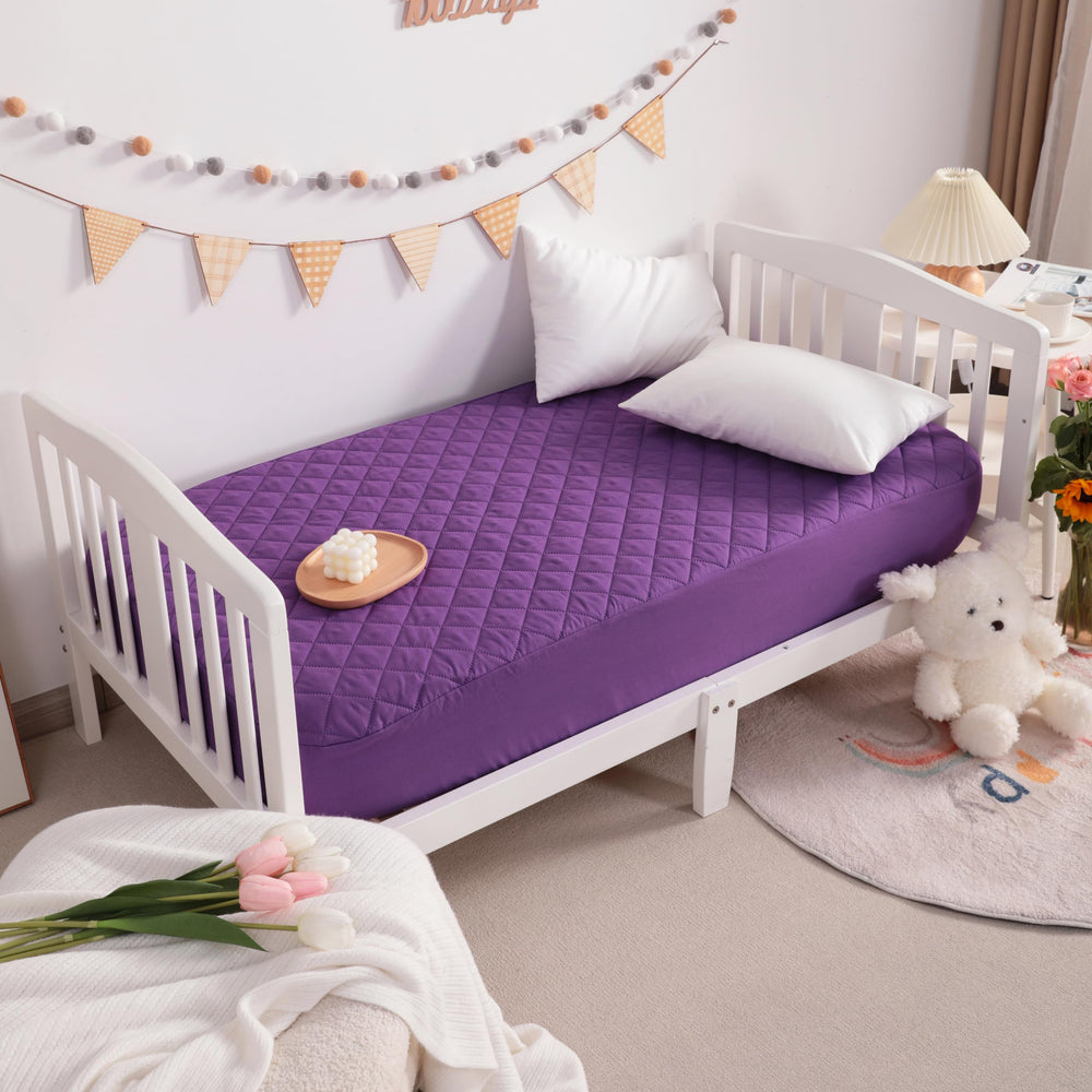 NTBAY protector on a baby playard during nap time for mess protection.