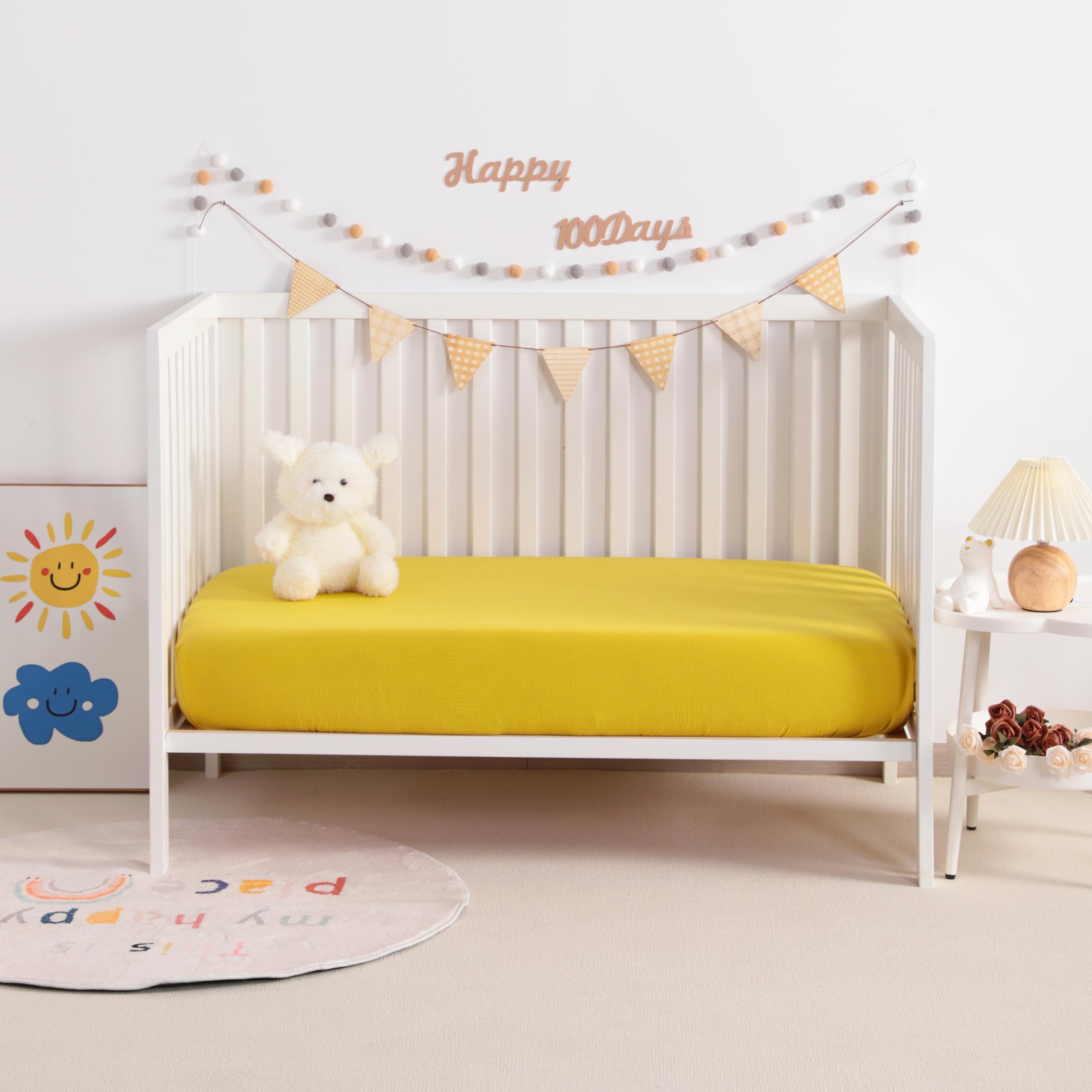 NTBAY mini-crib-sheet fit shows snug elastic for secure sleep