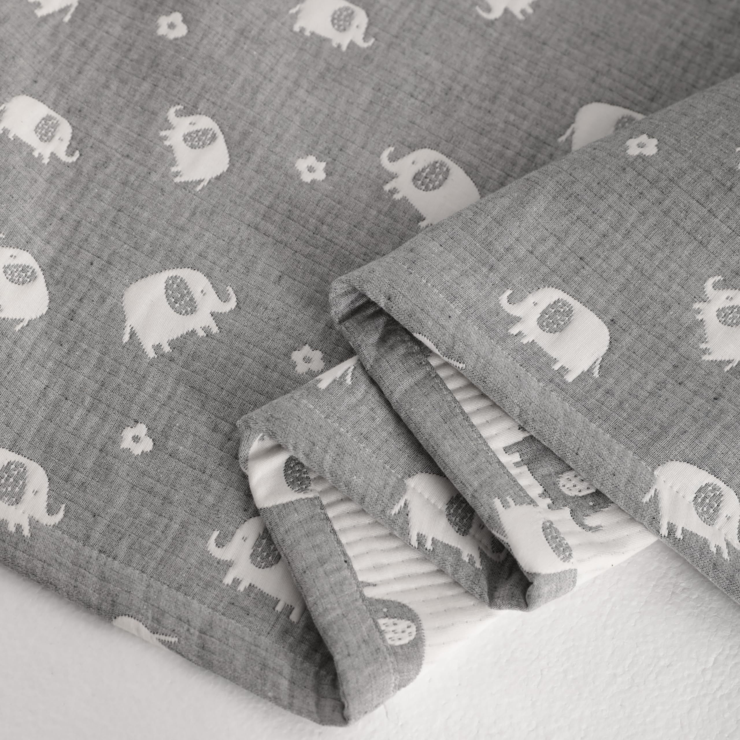 NTBAY muslin cotton blanket soft-texture closeup; breathable weave for gentle skin