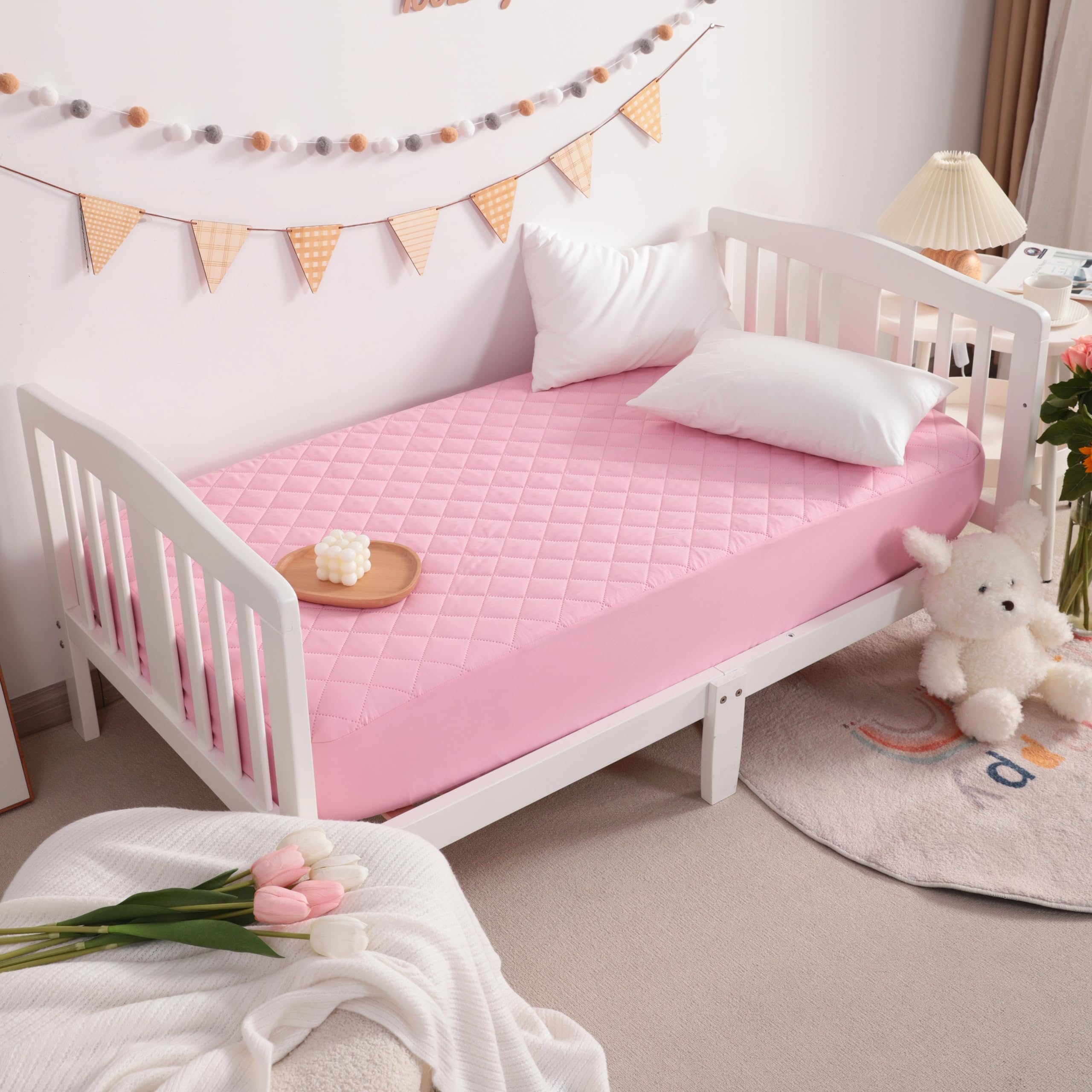 NTBAY pink sleeping setup showing baby-friendly, machine-washable care