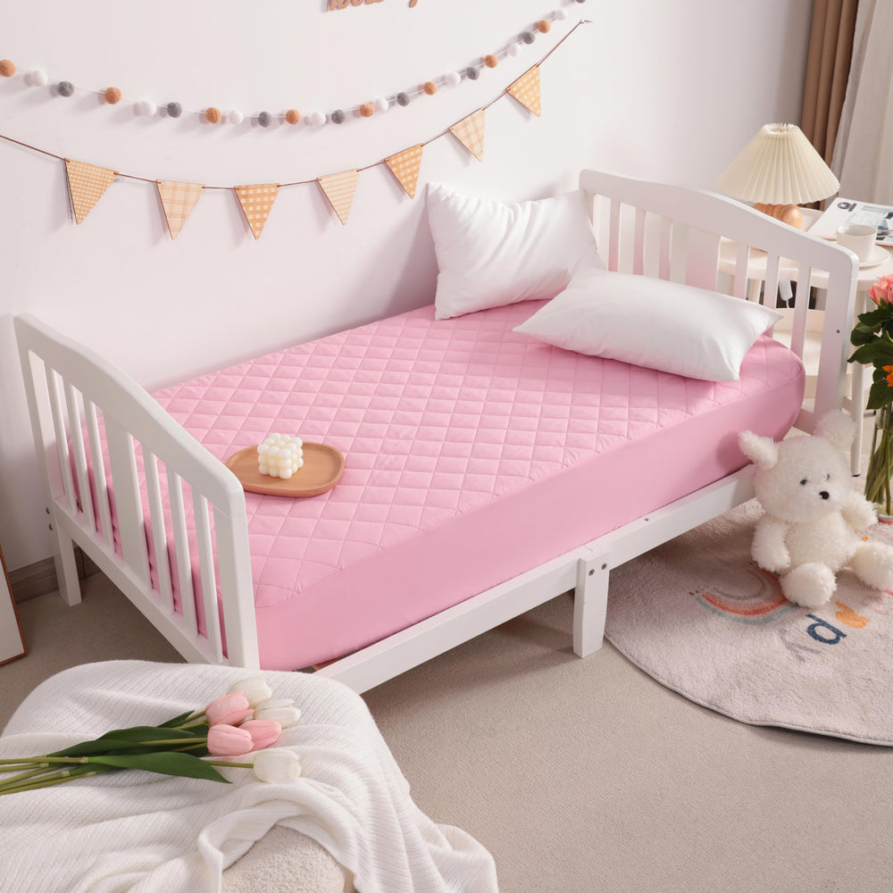 NTBAY pink sleeping setup showing baby-friendly, machine-washable care
