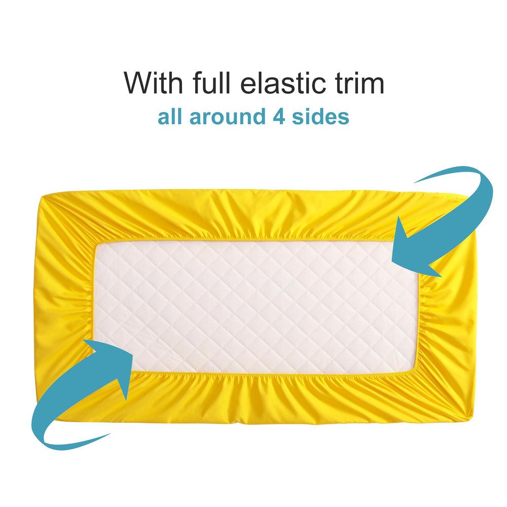 NTBAY quilted mini crib protector side view showing snug fit and protection.