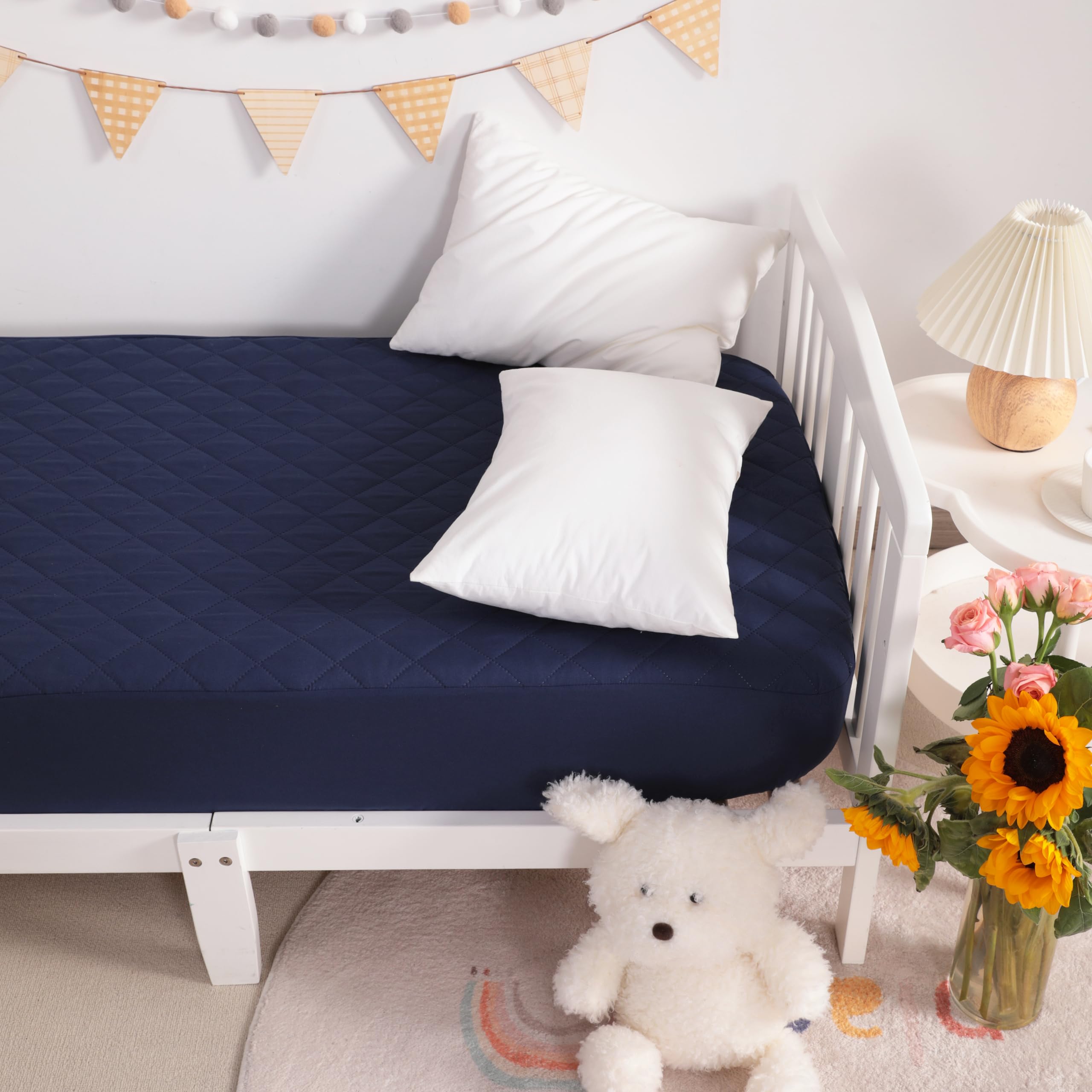 NTBAY six-inch pocket protects a snug, secure fit for mini cribs.