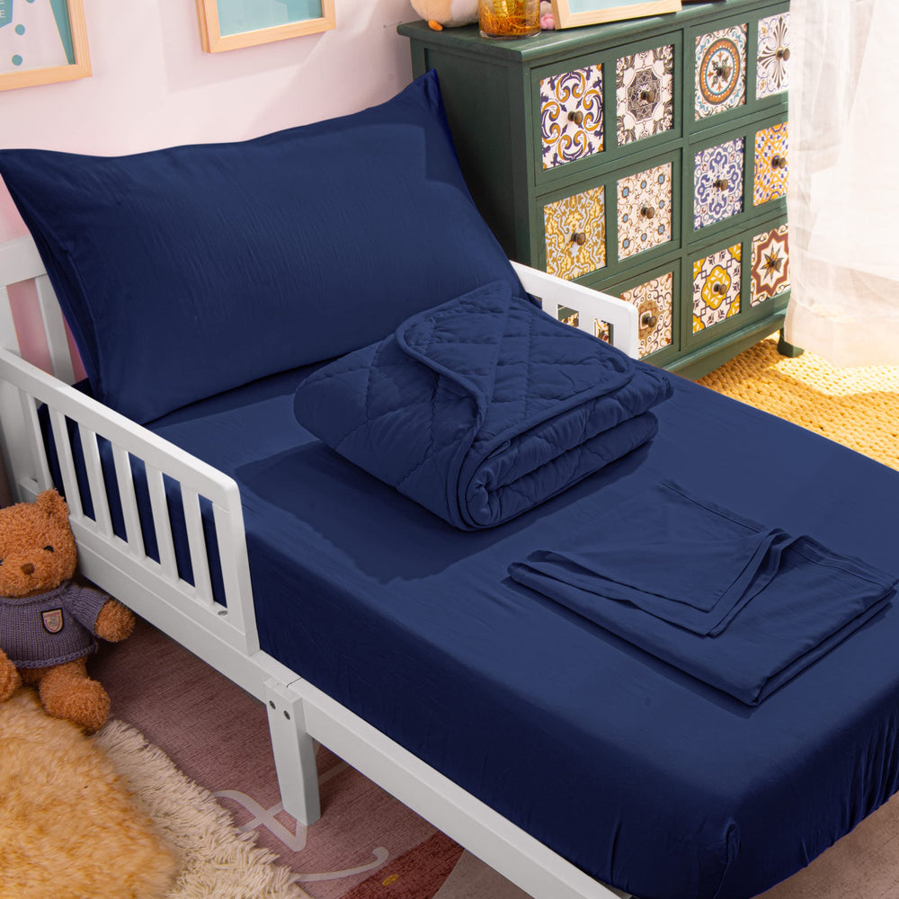 NTBAY Toddler Bedding Set quilt close-up shows cozy warmth for nap time.