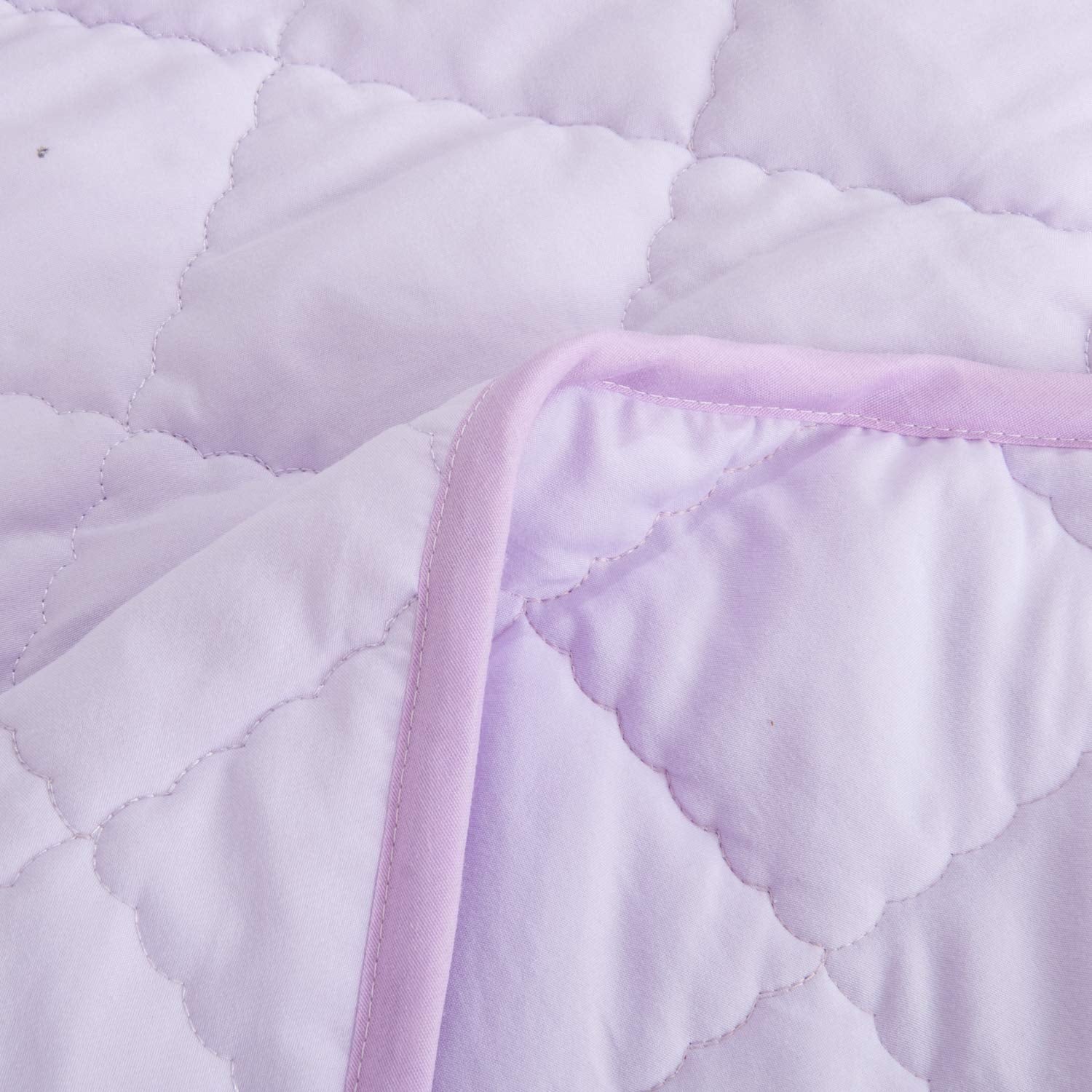 NTBAY toddler comforter 43x60 inch light purple on crib, perfect for naptime