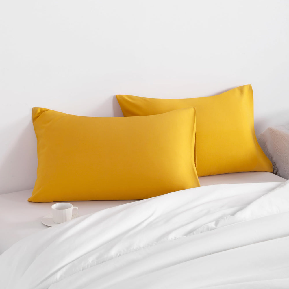 NTBAY ginger yellow pillow case with envelope closure for secure fit.